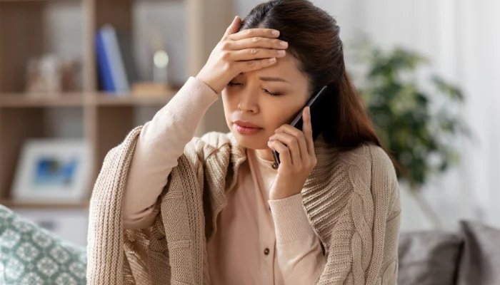 Patient speaking to a private GP by phone